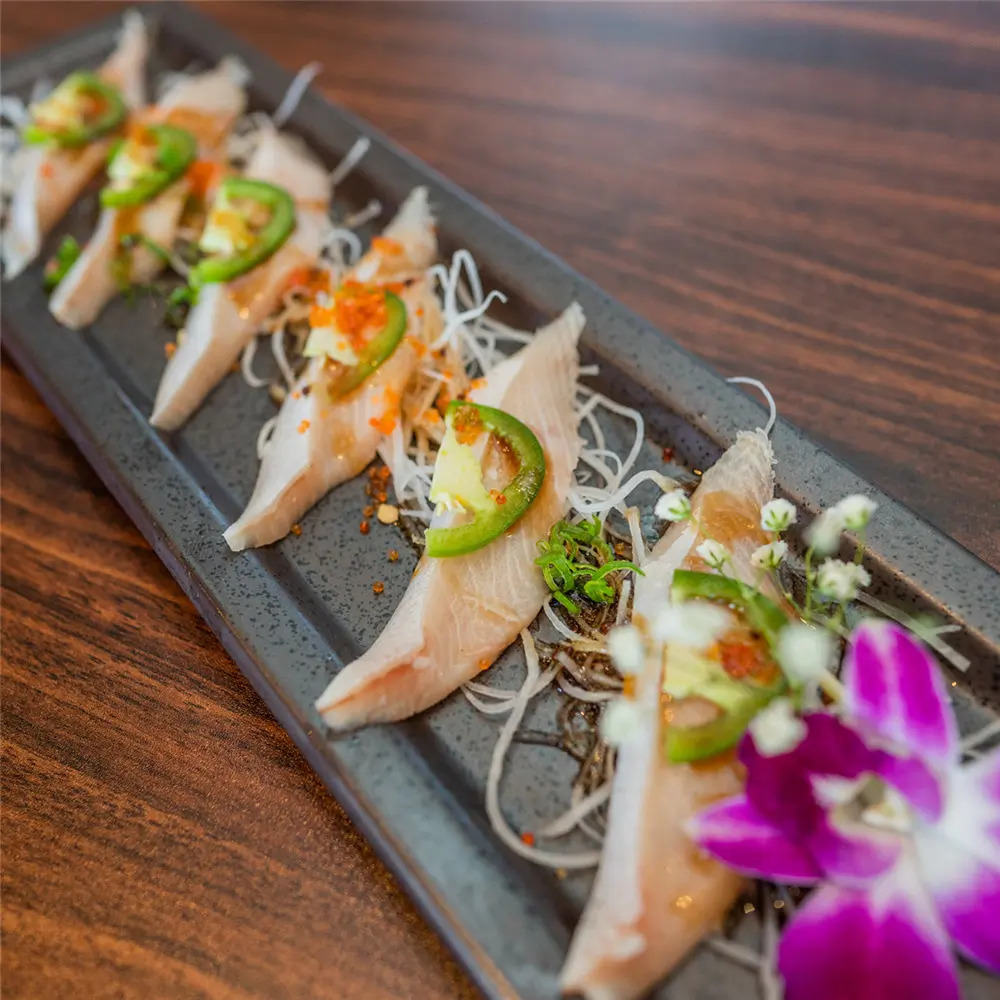 MJ-Sushi-Palo-Alto-Japanese-restaurant-Jalapeño-Tuna-Sashimi-CA Jalapeño Tuna Sashimi presents slices of fresh tuna garnished with jalapeño slices, tobiko at MJ Sushi - Palo Alto, a Japanese restaurant in CA