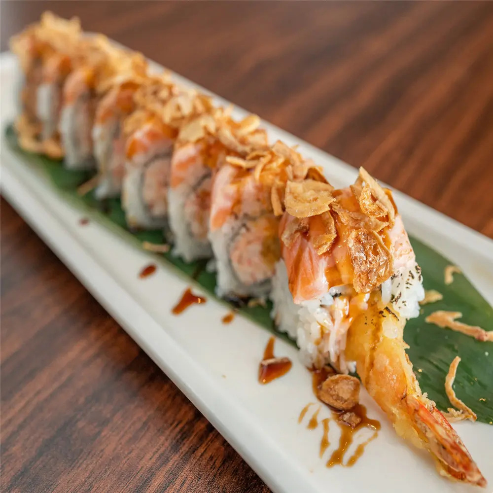 Salmon Prawn Crispy Sushi consists of sushi rolls with salmon and prawn